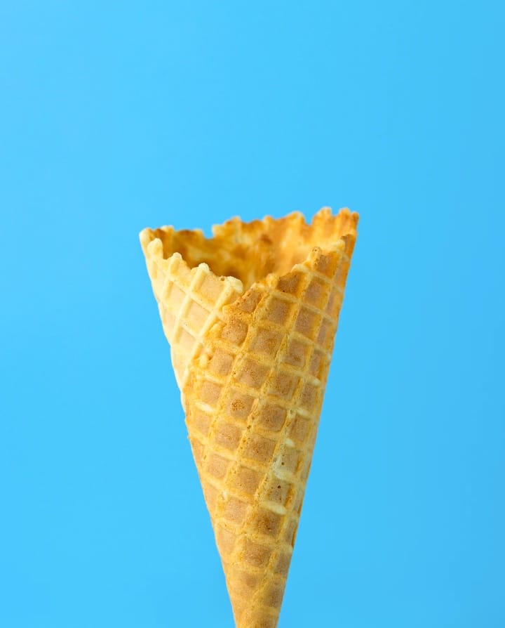 White egg on yellow background